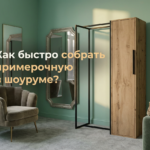 Металлическая вешалка для одежды в примерочной современного шоурума